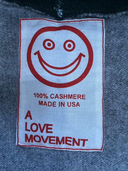 A LOVE MOVEMENT original 100% cashmere label